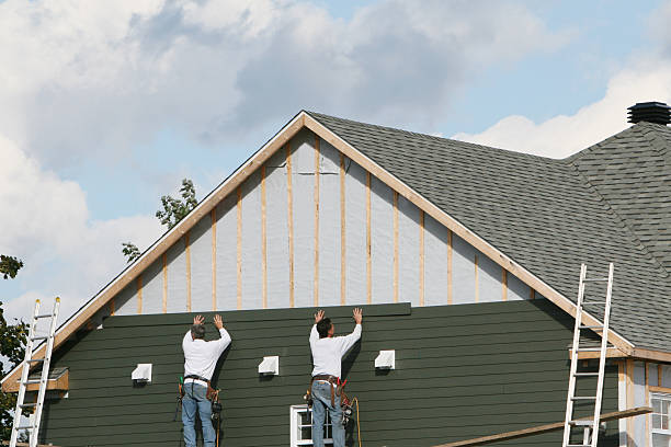 Professional Siding technician working in Saluda, NC